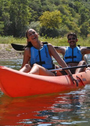 Α couple kayaking in Nestos river, having a good time